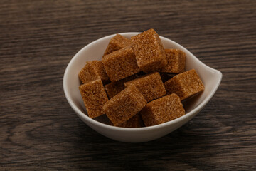 Cane sugar cubs in the bowl