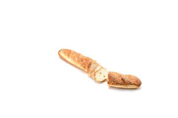 Baguette with sesame seeds cut into small pieces on a white background