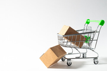 Shopping trolley with paper craft brown boxes