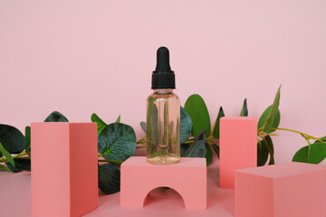 Transparent serum bottle with pipette on trendy pink podium. Serum container mockup. Cosmetics...