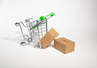 Shopping trolley green with paper craft boxes