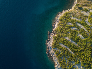 Croatia coastline from top down with beautiful summer light and blue water