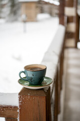 Fototapeta na wymiar cup of coffee in winter
