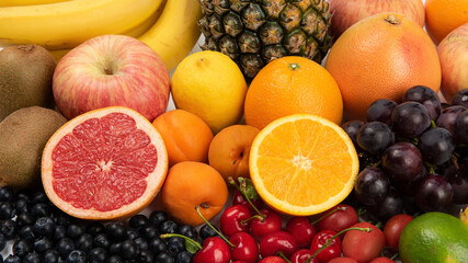 group of fresh ripe fruits . Food concept background.