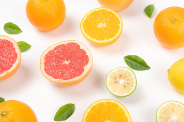 sliced of fresh fruits . orange and grapefruit .Food concept background.