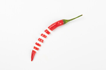 Slice of red hot little chili pepper pattern isolated on white background