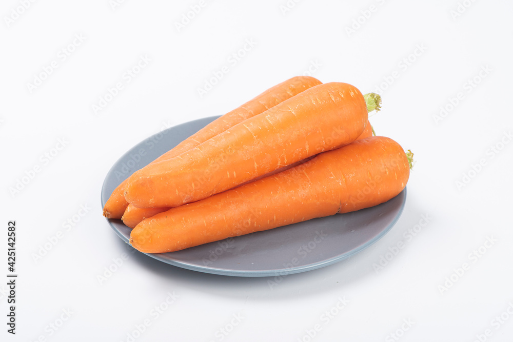 Wall mural fresh carrots isolated on white background