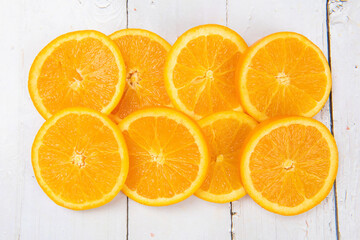 sliced of fresh orange fruits .Food concept background.