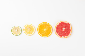 sliced of fresh fruits . orange and grapefruit .Food concept background.
