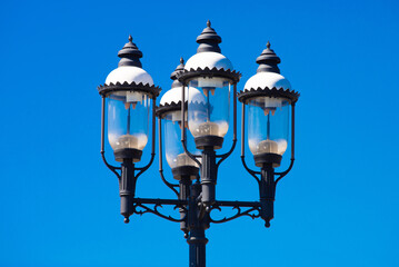 Fototapeta na wymiar street lights lamp outdoor city color day power