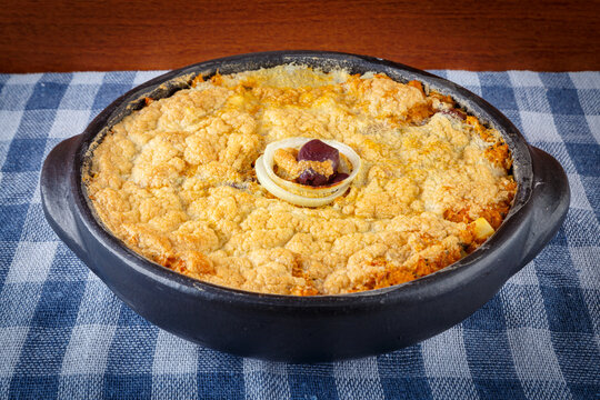 Vegetarian homemade pie, olive with tomatoes, onion and vegetables. Complete seafood - Torta Capixaba.