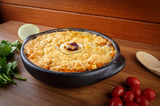 Vegetarian homemade pie, olive with tomatoes, onion and vegetables. Complete seafood - Torta Capixaba.