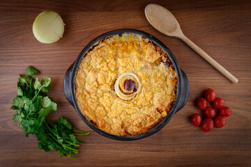 Vegetarian homemade pie, olive with tomatoes, onion and vegetables. Complete seafood - Torta Capixaba.