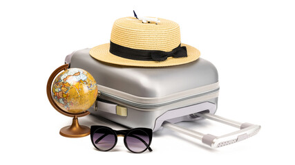 Bag travel. Suitcase, sunglasses with toy plane, straw hat and globe in travel composition isolated on white background. Copy space of summer vacation and business travel concept.