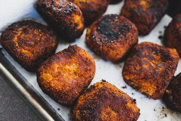 vegan arancini fried risotto balls in tray, healthy plant-based food