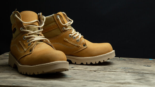 mustard colored boots with work or fashion style