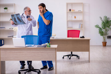 Fototapeta premium Two doctors working in the clinic