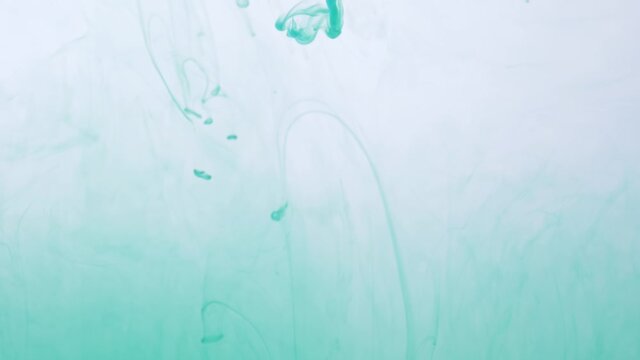 drop green ink paint in water