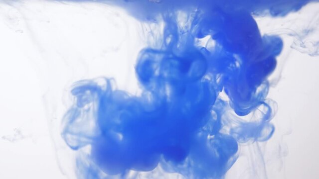 drop blue ink paint in water 