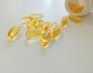 Fish oil capsules. Medicinal pills from the pharmacy to restore health.