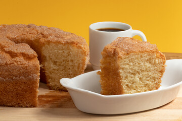 Delicious yogurt cake served with a cup of coffee.
