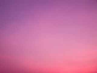 Abstract idyllic winter frosty orange and purple sky,background texture of colorful sunset. Twilight sky