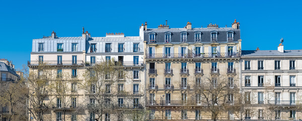 Paris, ancient buildings at Bastille, typical facades and windows
