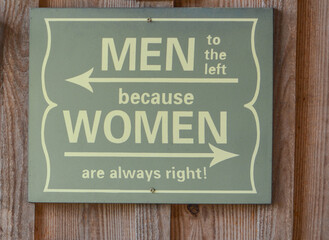 Fototapeta premium Men to the left because Woman are always right, sign