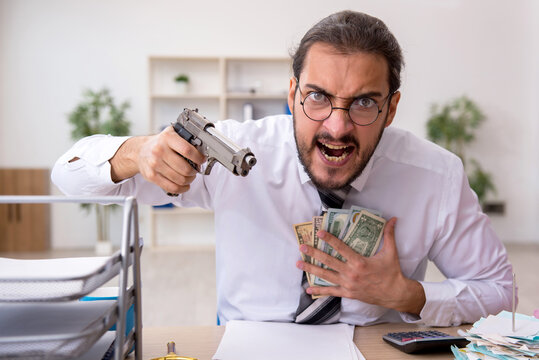 Angry male bookkeeper in bankruptcy concept