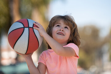 Basketball child player, cheerful and pleasant. Basket ball kids school.
