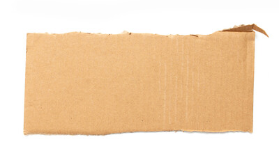 Cardboard sheet isolated on white background. Close-up