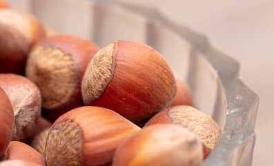 Close-up of fresh hazelnuts as background.