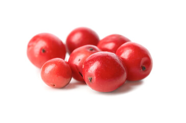 Red peppercorns on white background