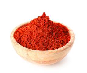 Bowl with red chili powder on white background