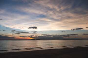 Naklejka na ściany i meble Landscape image of a beautiful sunset sky at the sea