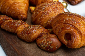 Croissant on wooden tabel background