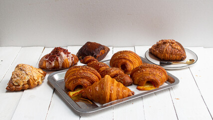Croissant on wooden tabel background