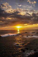 Beautiful colors of a sunset in the pacific ocean in the magical beaches of Costa Rica