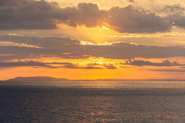 Beautiful colors of a sunset in the pacific ocean in the magical beaches of Costa Rica