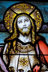 Christ looking to heaven stained glass window