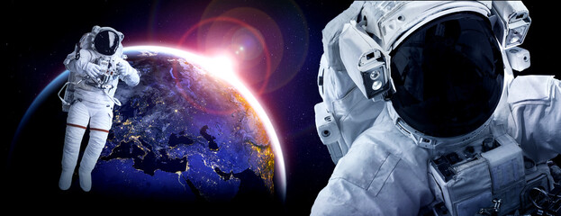 Astronaut spaceman do spacewalk while working for space station in outer space . Astronaut wear full spacesuit for space operation . Elements of this image furnished by NASA space astronaut photos. © InfiniteFlow