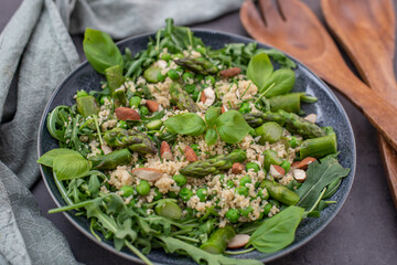 healthy spring couscous salad with asparagus and herbs