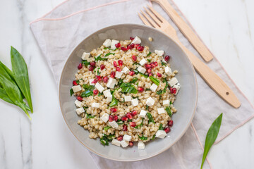 healthy spring couscous salad with asparagus and herbs