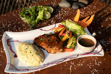 chicken steak with mush potato and grilled vegetables 
