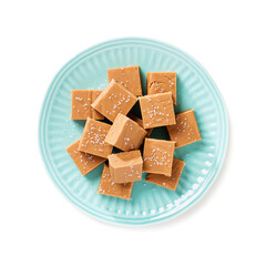Fresh homemade peanut butter fudge or caramel fudge isolated on white background, top view