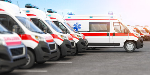 Ambulance cars in a row on a parking.