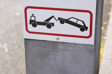 Sign evacuation of car to impound No parking any time Punishment symbol