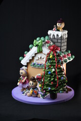 cookie house for christmas, with characters and christmas tree