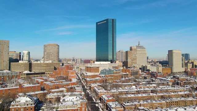 Boston Back Bay skyline aerial view including John Hancock Tower and Berkeley Building in winter, Boston, Massachusetts MA, USA. 