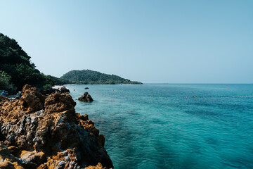 beautiful soft wave clear blue transparency sea ocean water and rocks at the bottom of the tropical paradise beach coast summer sea view at koh kham Samae SanIsland, Sattahip, Chonburi, Thailand